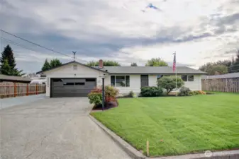 View from front driveway and extra parking on the left.