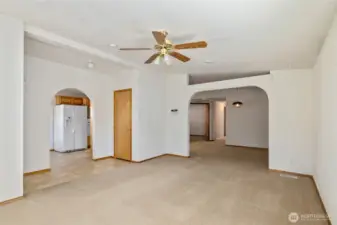 Large Living room with easy views of Dining Room & Kitchen.