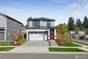 Here is the Daffodil plan on another homesite within the community showing the same elevation, the home for sale will have a different exterior color. Situated on a flat corner homesite (31 feet from the back of the house to the fence, in a quiet location close to Redmond and downtown Kirkland.  This is a single-family home with 2-Car attached garage and ample driveway!