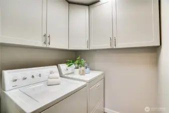 The laundry room in the unit is convenient and has plenty of cabinet space for the Costco run.