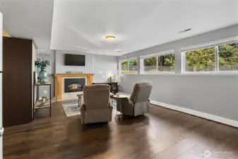 1st floor living area, brand new laminate floors, paint and look at the view from here! Gas Fireplace too!