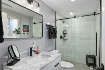 Downstairs completely remodeled BRAND NEW Bathroom! All three bathrooms in those are brand new Beautifully updated!