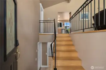 Welcome Home, front entry leading up or downstairs, all REAL hardwood floors.