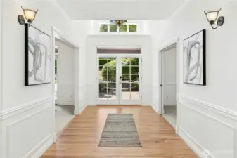 Foyer opens to dining room on one side and home office on the other.