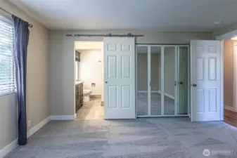 Another view of the primary bedroom.