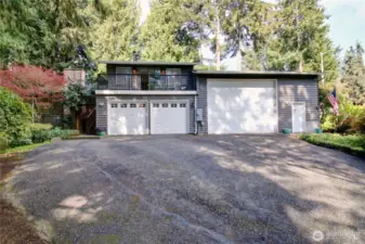 Large Private treed lot. 2 car garage and 4 car shop attached!