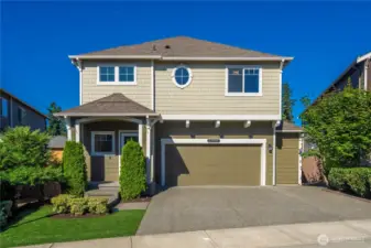 Front of house, expanded driveway
