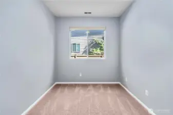 Main floor bonus room, perfect for an office/den