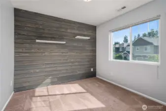 Upstairs bedroom #4 with decorative wall