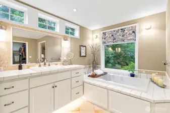Indulge in the deep Jacuzzi soaking tub, perfect for unwinding after a long day, now enhanced with new lighting, updated plumbing fixtures, and fresh paint for a spa-like retreat you’ll love coming home to.