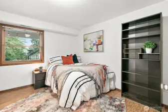 Versatile lower-level flex room could be used for a home office, gym, or additional living space.