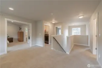 Ascend the stairs to your Large Loft/Bonus space. Let's tour the left...