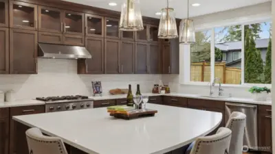 Full-height cabinetry with illuminated glass uppers.