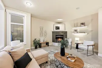 Cozy up in the living room with a gas fireplace and carpeted floors.