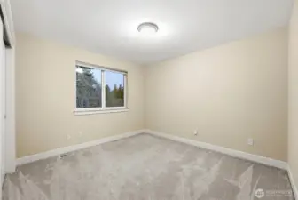 Bedroom 3 upstairs with wall-to-wall carpeted flooring.