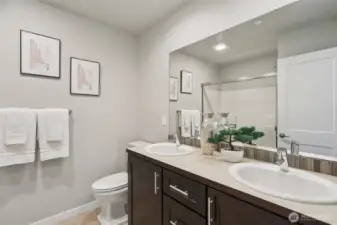 Double sink in the primary bathroom.