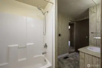 Jack and jill Bathroom leading to 2 bedrooms, laundry room (Mudroom)