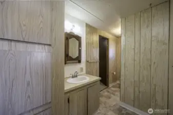 2nd full bath leading to bedroom 1 & 2, Laundry and mudroom