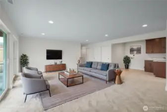 Virtually staged Rec Room/Multi-generational living with w/d hookup.