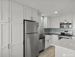 Built in pantry cabinets provide additional space for all of your cooking and baking needs.