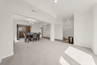 Formal living room transitions to the formal dining room