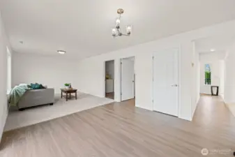 Laundry and powder room located off the family room