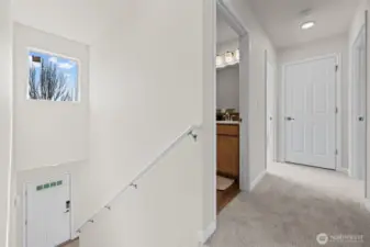 Second level hall with linen closet at the end
