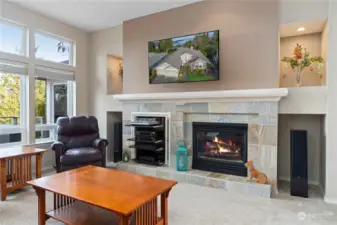 Living room has a propane fireplace, art nooks and perfect spot for your entertainment equipment.