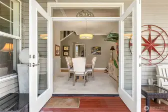 French doors lead to the back deck and patio.