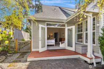 French doors open to a private patio just off the primary bedroom, offering a peaceful retreat right outside your door.
