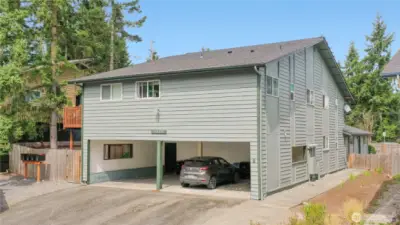 Tandem parking for two vehicles, carport and uncivered.