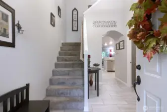 From the front door looking at the hallway and stairs