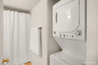 Washer/dryer located in hallway bathroom