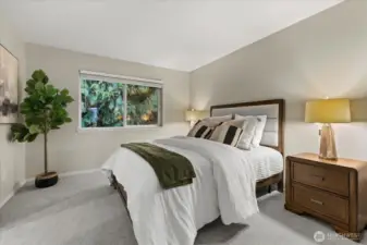 primary bedroom looks out to private backyard