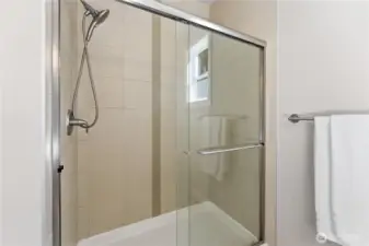 Downstairs 3/4 bathroom located on the main floor, highlighted by a walk-in shower and a very clean, well-kept space