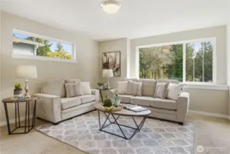 Heading upstairs, you arrive at a bright and spacious bonus room filled with natural light.  TV room, playroom or ?