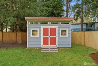 A spacious backyard shed ready for your vision — perhaps an office, a gym, or a cozy retreat of your own