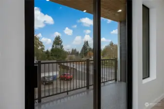 Large covered balcony to enjoy the neighborhood sounds with your morning coffee.