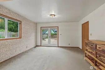 French doors lead to deck/patio/pond & gardens from your giant first level main suite.
