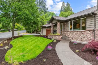 Beautiful yard and concrete work, front brick work, newer vinyl windows, furnace & heat pump.