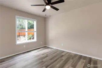 one of the bedrooms. All are nice sized. Ceiling fans throughout