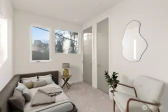 Main floor ADU Bedroom/office. Virtually staged-pic is of similar unit