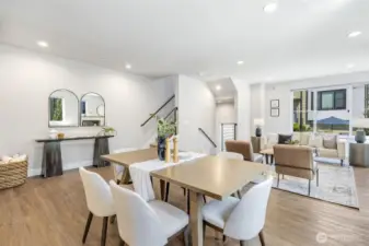 Dining area is roomy enough for a table for ten, all set for festive gatherings, Sunday brunches, or game night with friends