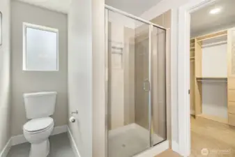 Walk-in shower with built-in shelves