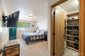 Primary bedroom with walk in closet