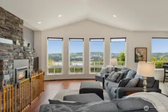 Breathtaking views from every window in the living area. Hardwood floors and dramatic stacked-stone fireplace keep it cozy.