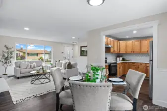 A thoughtfully designed floor plan unites the main living areas, fostering a welcoming environment ideal for both gatherings and quiet moments.
