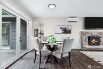 rench doors in the cozy dining area frame views of the private backyard, enhancing natural light and blending indoor comfort with outdoor beauty