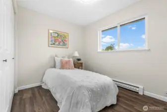 Each room includes a built-in closet, a window for natural light, and hard surface flooring—an ideal choice for those with allergy sensitivities.