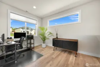 Clean and inviting second bedroom ideal for office, creative space or a welcoming guest room. With 3/4 bath conveniently located directly across the hallway.